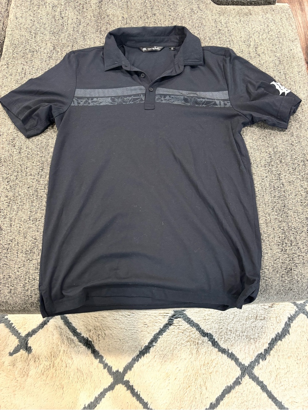 Men's Black Polo Shirt with Subtle Chest Stripe